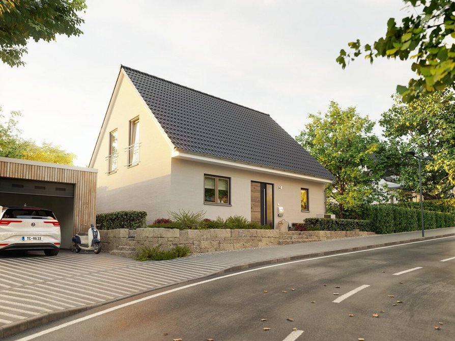 Das Flair 134 mit Sicht von der Straße auf das Einfamilienhaus mit Satteldach in Anthrazit, optionalem Carport und einladendem Eingangsbereich.